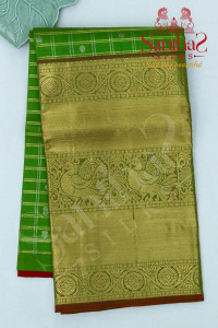meenakshi-green-colour-checked-body-in-butta-with-contrast-blouse-border