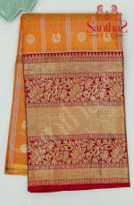 YELLOW COLOUR TISSUE BODY WITH CONTRAST BLOUSE & BORDER