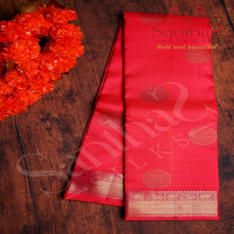 PINKISH ORANGE COLOUR IN BODY YAALI BUTTA THREAD EMBOSED WITH SELF BLOUSE & BORDER