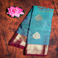 blueish-green-colour-body-golden-leaf-zari-butta-with-contrast-blouse-border