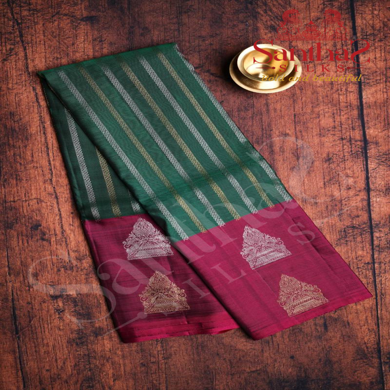 BOTTLE GREEN COLOUR BODY STRIPS ZARI WITH CONTRTAST BLOUSE & BORDER