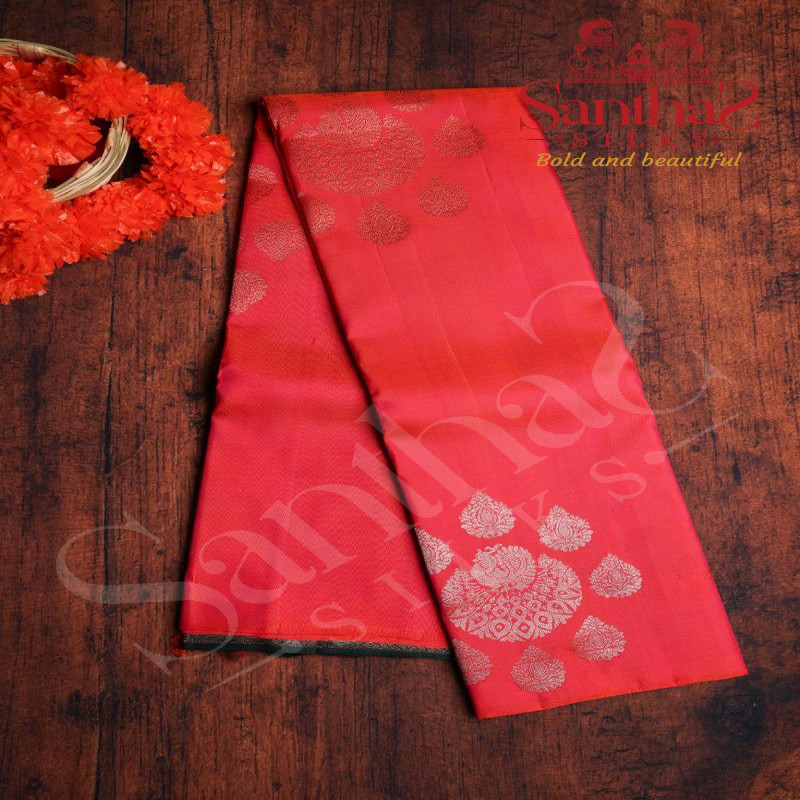 PINKISH ORANGE COLOUR BODY COPPER ZARI SELF PATTERN WITH CONTRAST BLOUSE & BORDER