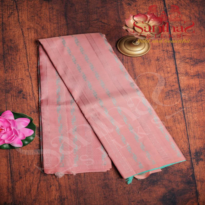 PEACH COLOUR BODY SELF COPPER ZARI STRIPS WITH CONTRAST BLOUSE