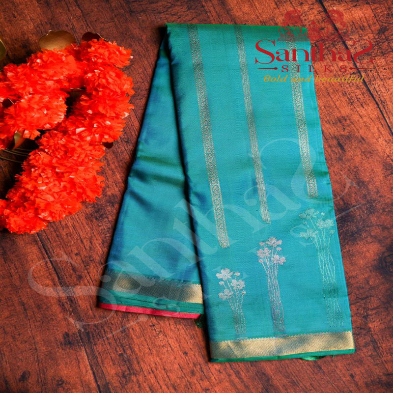 BLUISH GREEN COLOUR BODY GOLDEN ZARI STRIPS SELF BORDER WITH CONTRAST BLOUSE