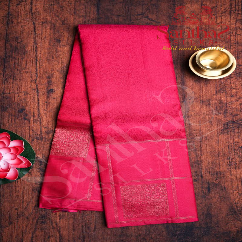 RUBY PINK COLOUR BODY FLORAL EMBOSED PATTERN COPPER ZARI BUTTA WITH SELF BLOUSE