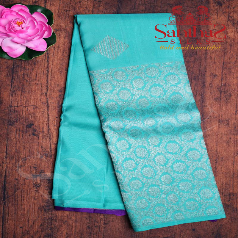 AQUAMARINE COLOUR BODY IN SILVER ZARI BUTTA WITH CONTRAST BLOUSE