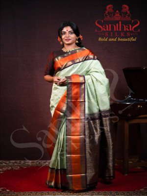 pastel-green-kanjivaram-silk-saree-with-rich-orange-border