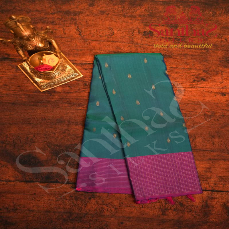 PEACOCK BLUE COLOUR BODY GOLDEN ZARI LEAF BUTTA WITH CONTRAST BLOUSE & BORDER