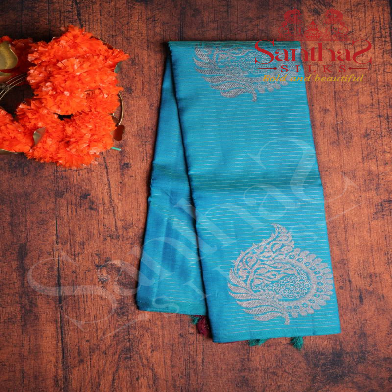 BORDERLESS RAMAR BLUE COLOUR BODY WITH STRIPS & BIG MOTIFS AND DARK BROWN COLOUR CONTRAST BLOUSE