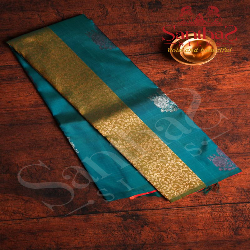 BORDERLESS PEACOCK BLUE COLOUR BODY WITH BIG MOTIFS AND ORANGISH ROSE CONTRAST BLOUSE