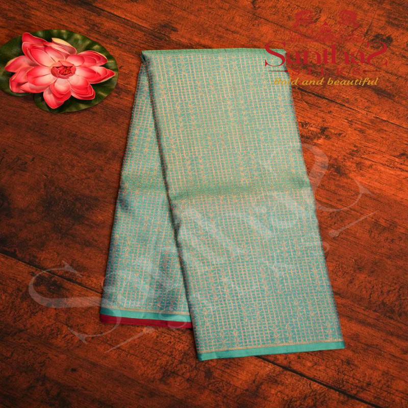 AQUAMARINE BLUE COLOUR BODY GOLDEN ZARI MOTIFS WITH CONTRAST BLOUSE