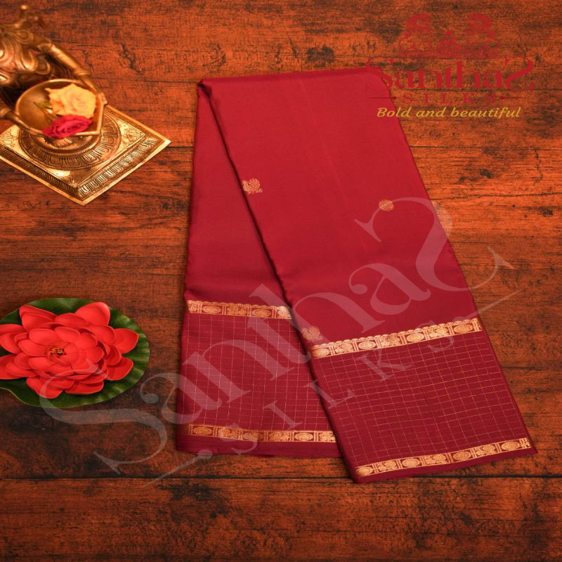 MAROON COLOUR BODY WITH GOLDEN ANNAM CHAKKARAM ZARI MOTIFS AND SELF BLOUSE