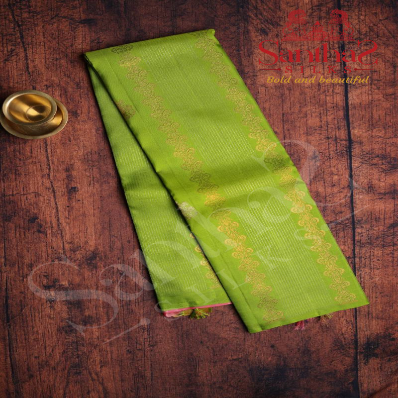 PARROT GREEN COLOUR BODY RAIN DROP COPPER ZARI BUTTA WITH CONTRAST BLOUSE