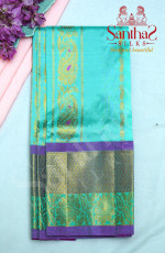 TURQUOISE  BLUE BODY WITH CONTRAST BLOUSE AND BORDER