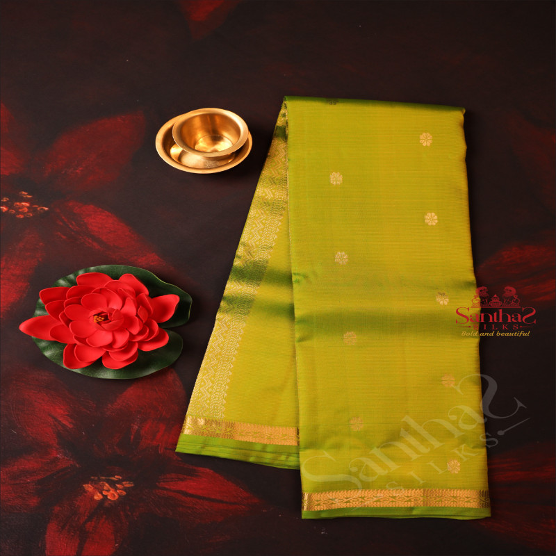 VOLT GREEN COLOUR BODY WITH GOLDEN ZARI BUTTAS & SELF BLOUSE