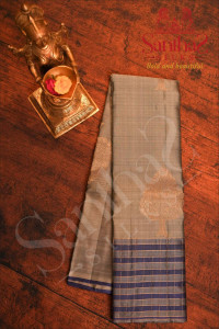 grey-colour-body-with-golden-zari-leaf-motifs-and-contrast-blouse