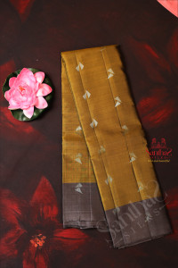 pear-green-colour-body-with-fancy-zari-butta-with-contrast-blouse-border