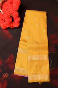 bright-yellow-colour-body-with-silver-zari-butta-with-contrast-blouse-border