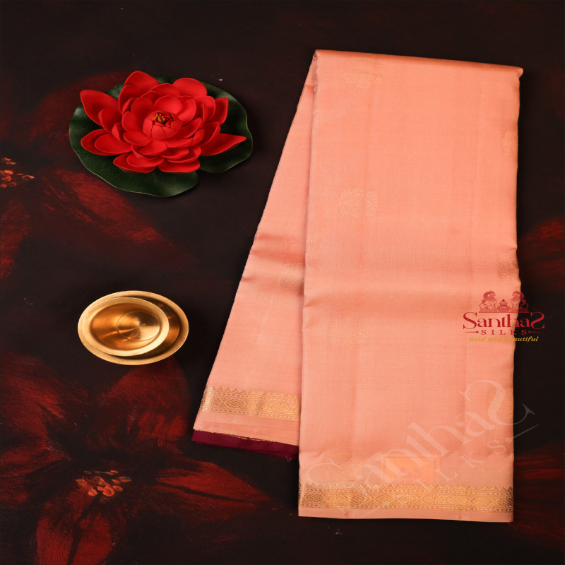 PASTEL PEACH COLOUR BODY WITH COPPER ZARI BUTTA & CONTRAST BLOUSE