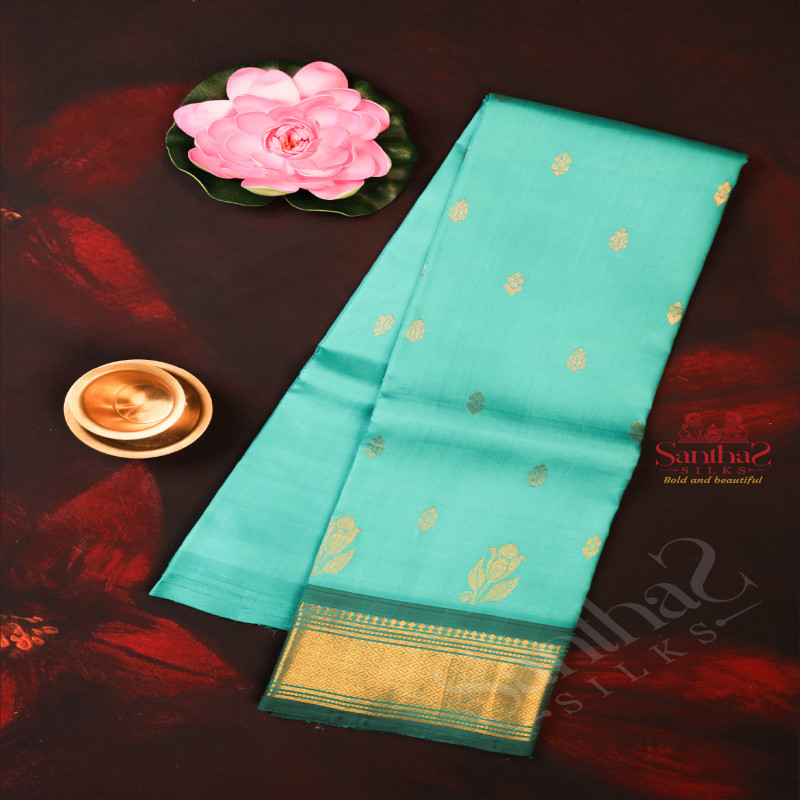 BRIGHT TEAL COLOUR BODY WITH GOLDEN ZARI BUTTAS & SINGLE SIDE BORDER AND CONTRAST PALLU WITHOUT BLOUSE