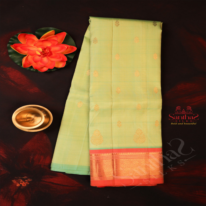 ONE SIDE BORDER PISTHA GREEN COLOUR BODY WITH GOLDEN ZARI BORDER & WITHOUT BLOUSE