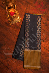 navy-blue-colour-body-with-copper-and-silver-zari-kodi-malar-pattern-and-contrast-blouse