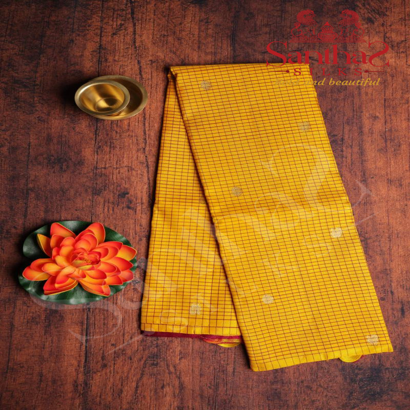 BORDERLESS DARK YELLOW COLOUR WITH MAROON COLOUR THREAD SMALL CHECKED BOXS AND MAROON CONTRAST BLOUSE