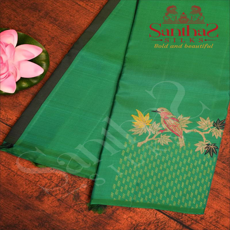 BORDERLESS FUN GREEN COLOUR BODY WITH MULTI COLOUR ZARI BIRD MOTIFS AND CONTRAST BLOUSE