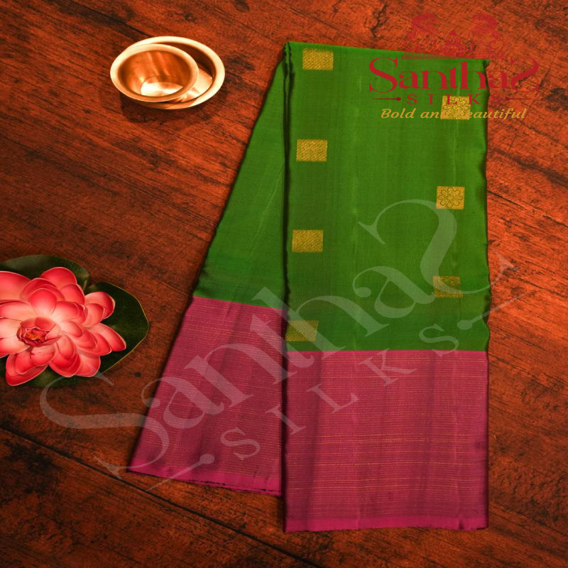 EMERALD GREEN COLOUR BODY WITH GOLDEN ZARI BUTTAS AND CONTRAST BLOUSE