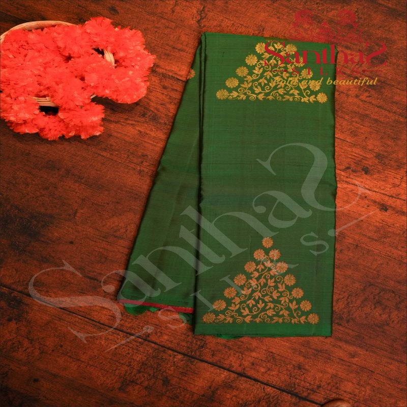 BORDERLESS BOTTLE GREEN COLOUR BODY WITH GOLDEN & COPEER ZARI TRIANGLE MOTIFS AND CONTRAST BLOUSE