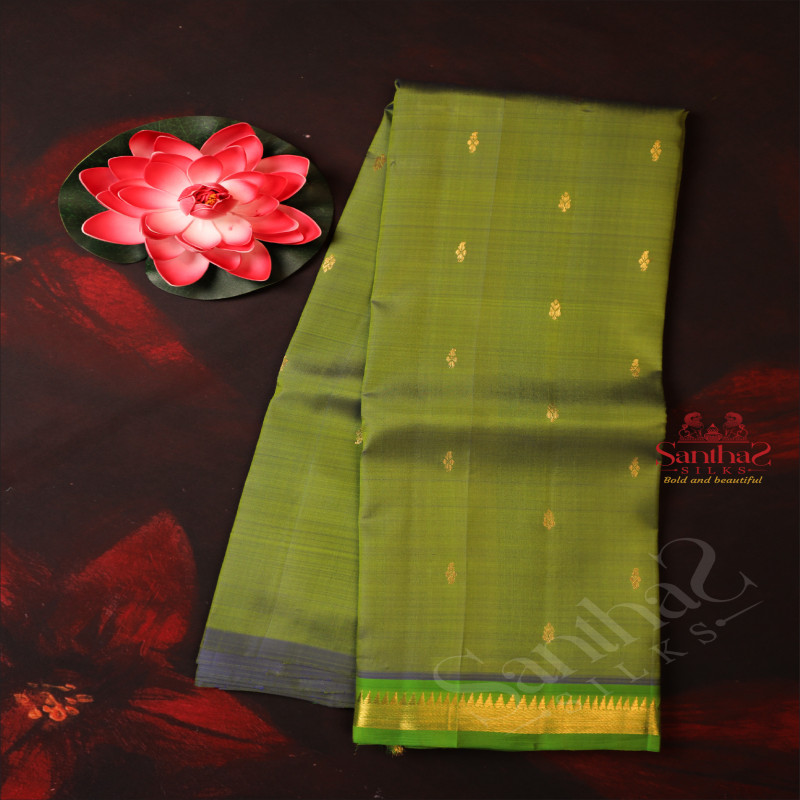 ONE SIDE BORDER GREENISH BLUE COLOUR BODY WITH GOLDEN ZARI BUTTA & WITHOUT BLOUSE