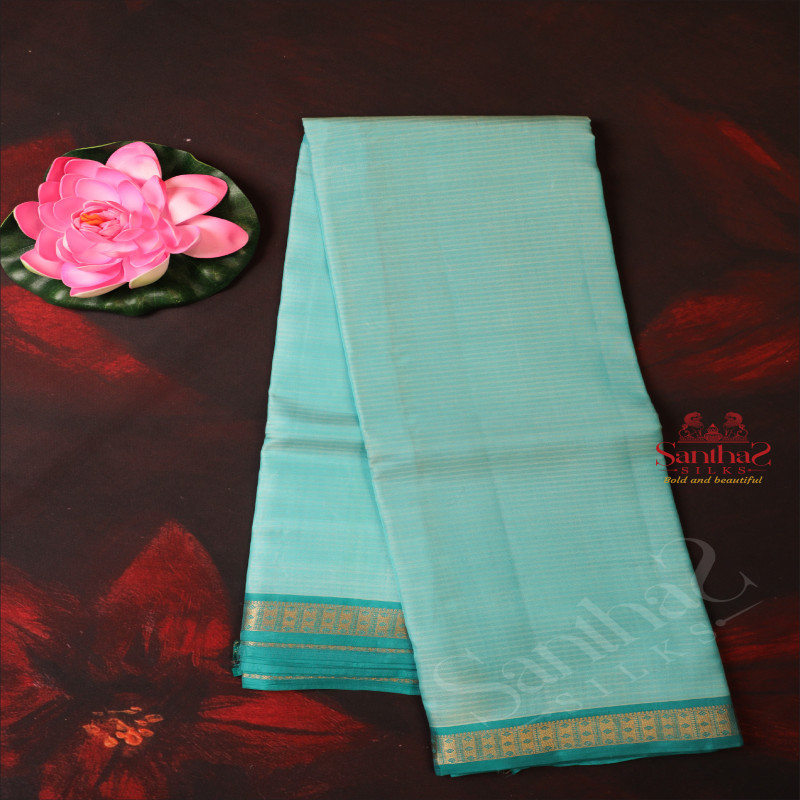 ICE BLUE COLOUR BODY WITH PLAIN STRIPS WITH SELF BLOUSE & BORDER