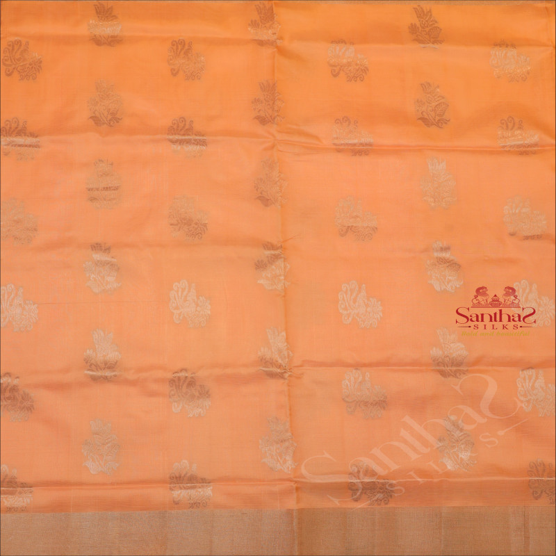 LIGHT PEACH COLOUR BODY WITH SILVER ZARI PEACOCK BUTTA WITH SELF BLOUSE