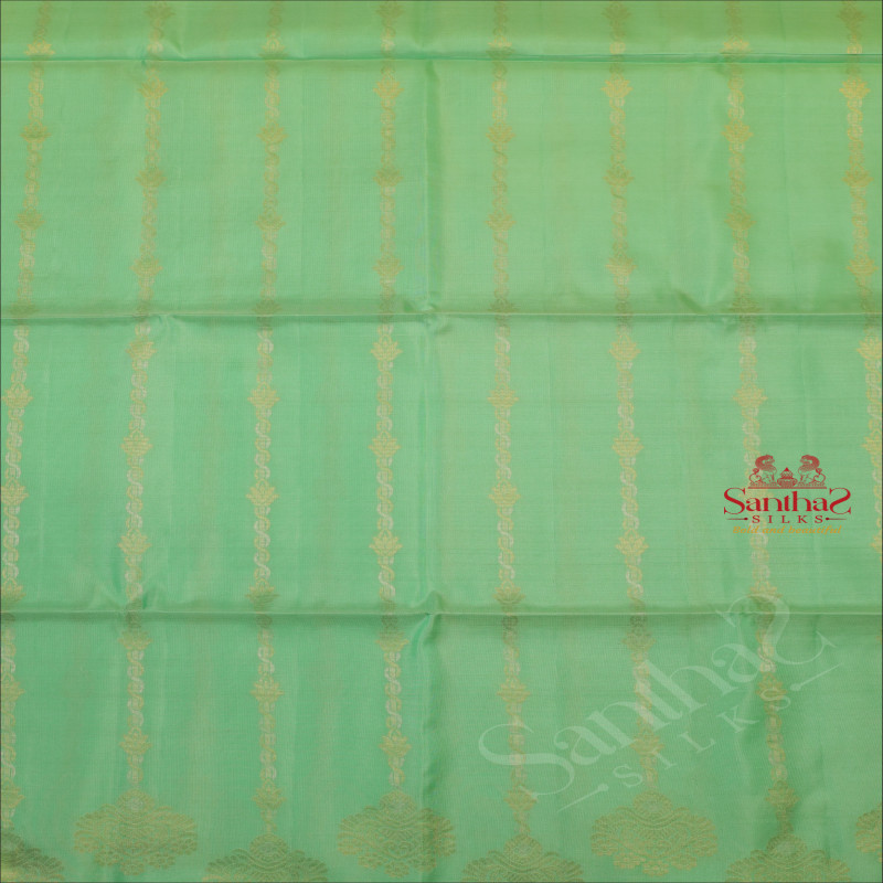 CONAMARA GREEN COLOUR BODY WITH GOLDEN & SILVER ZARI MOTIFS AND CONTRAST COLOUR PALLU & BLOUSE