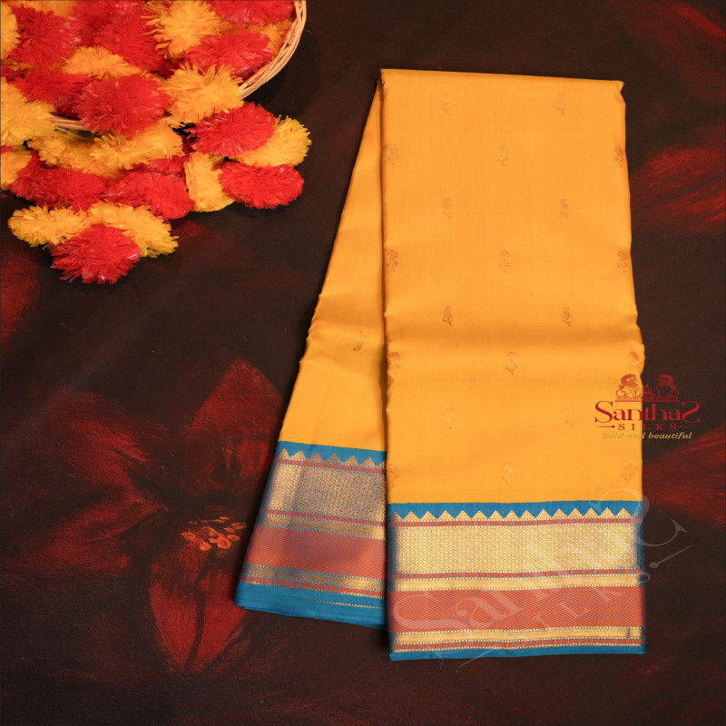 MUSTARD YELLOW COLOUR BODY WITH GOLDEN ZARI FLOWER BUTTA WITH CONTRAST BLOUSE & BORDER