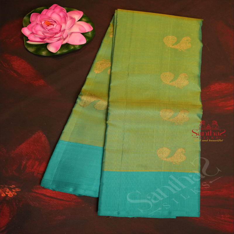 MINT AND TURQUOISE MIXED COLOUR BODY WITH GOLDEN ZARI PEACOCK MOTIFS AND CONTRAST COLOUR BLOUSE & PALLU