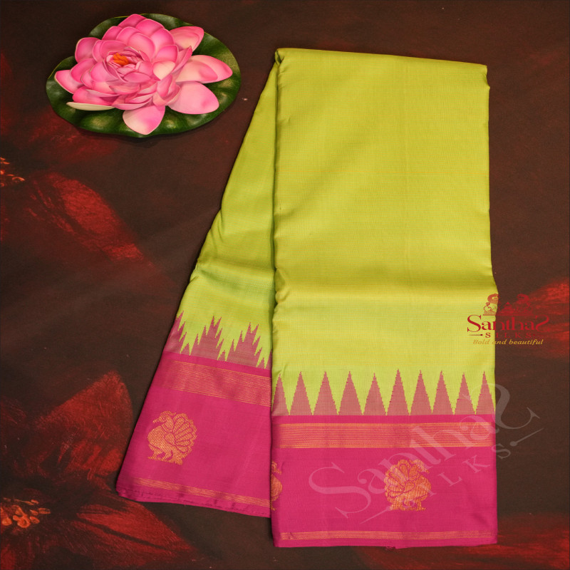 MINT GREEN COLOUR BODY GOPURAM AND ANNAM BUTTA WITH CONTRAST BLOUSE & BORDER