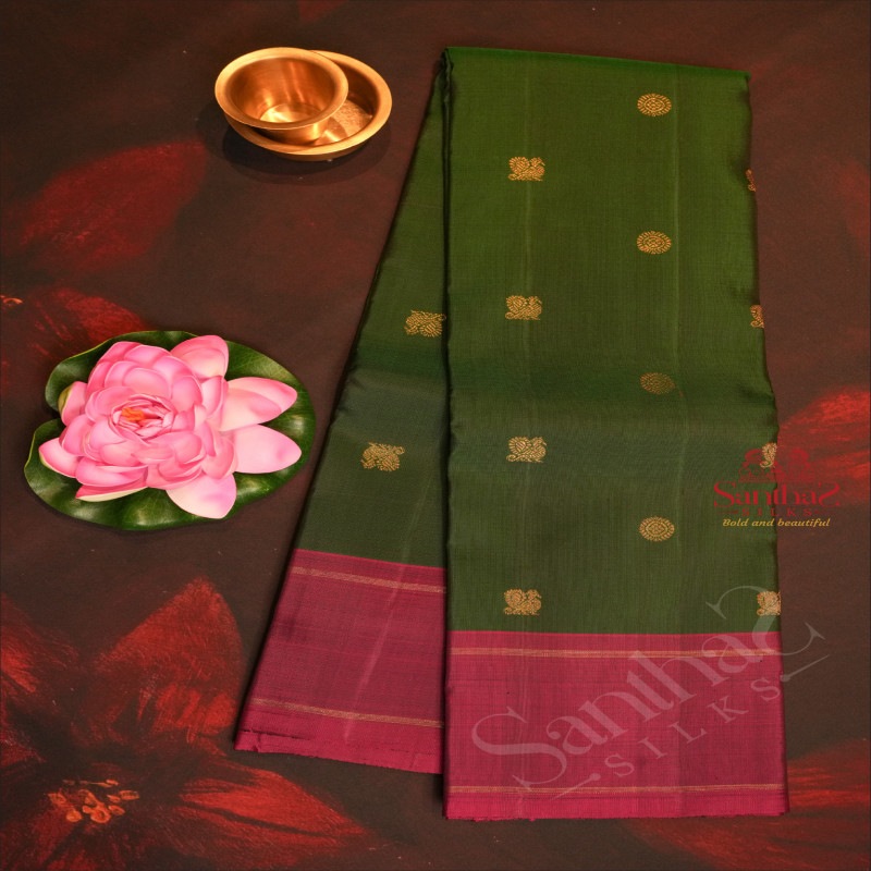 DARK GREEN COLOUR BODY WITH GOLDEN ZARI SMALL CHAKRA BUTTAS & PEACOCK MOTIFS AND CONTRAST COLOUR BLOUSE & PALLU