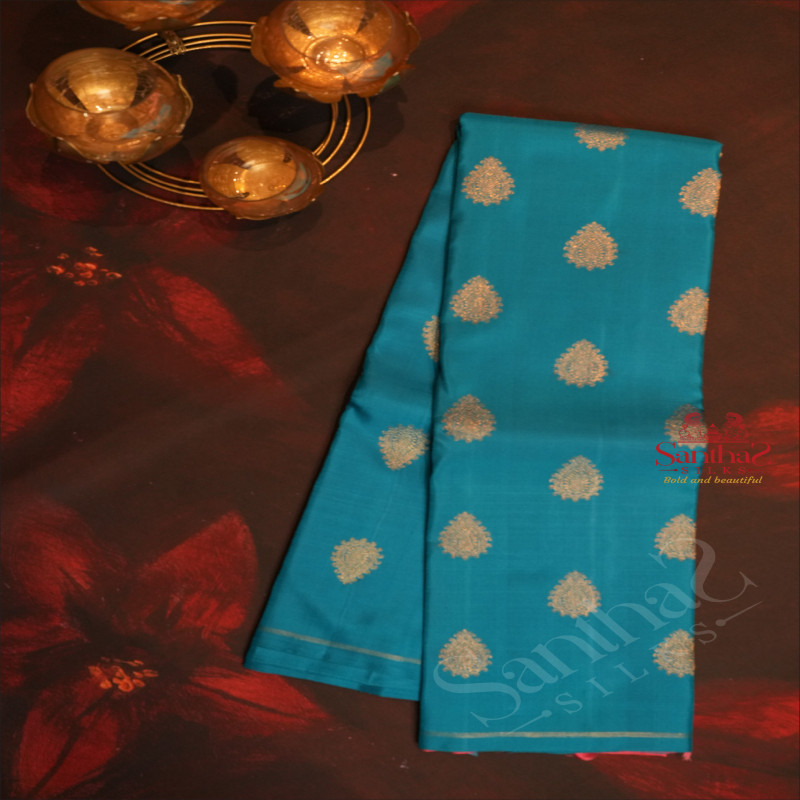 ANANDHA BLUE COLOUR BODY WITH GOLDEN ZARI BUTTA WITH CONTRAST BLOUSE