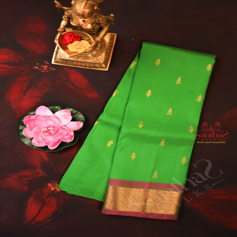 ONESIDE BORDER GREEN COLOUR BODY WITH GOLDEN ZARI BUTTA & WITHOUT BLOUSE