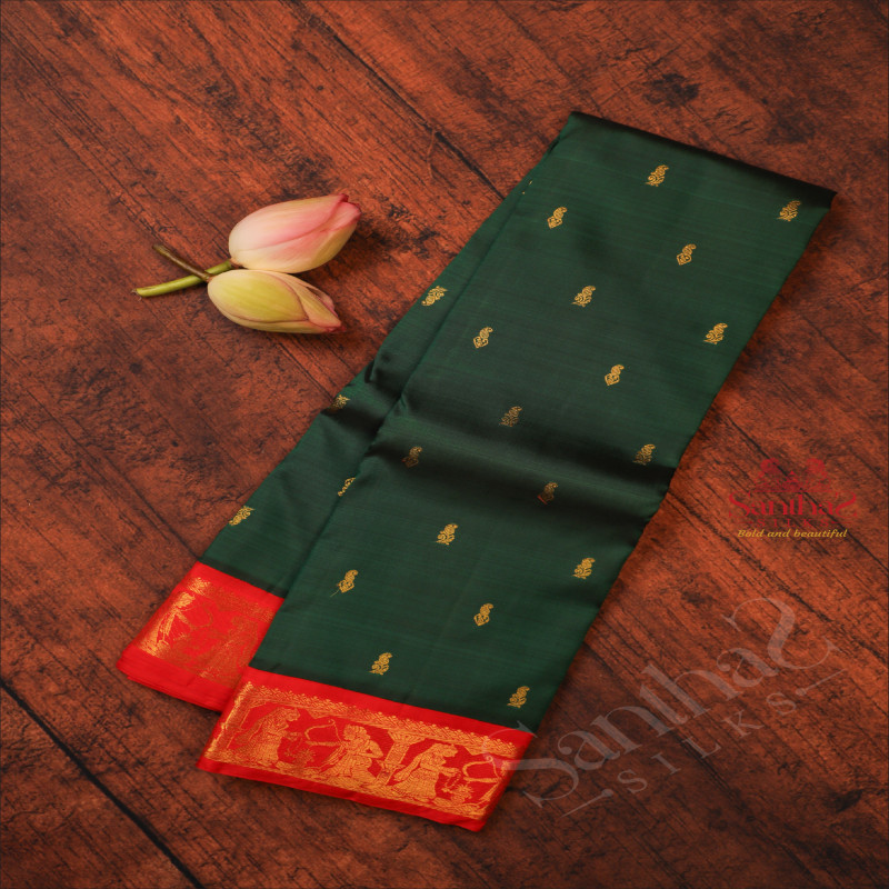 BOTTLE GREEN COLOUR BODY WITH GOLDEN ZARI BUTTA WITH CONTRAST BLOUSE & BORDER