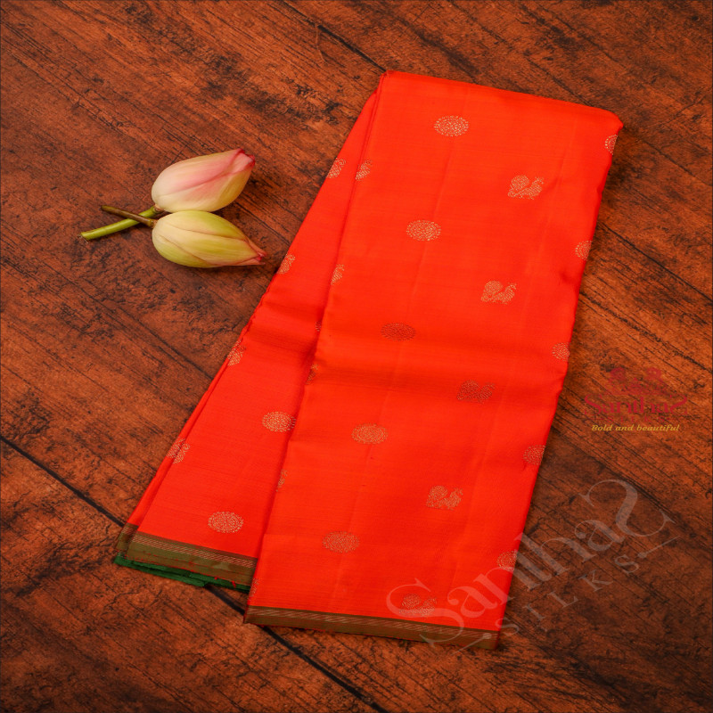 ORANGE COLOUR BODY WITH GOLDEN ZARI ANNAM CHAKKARAM BUTTA WITH CONTRAST BLOUSE