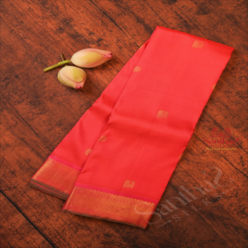 PINKISH PEACH COLOUR CHECKED BODY WITH GOLDEN ZARI ANNAM CHAKKARAM BUTTA WITH CONTRAST BLOUSE