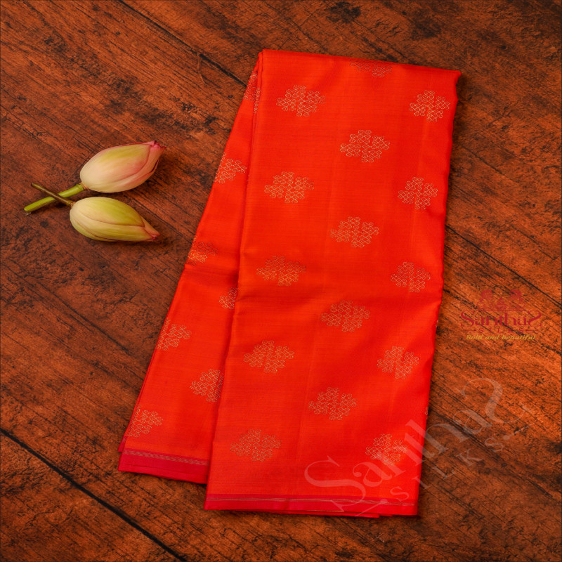 ORANGE COLOUR BODY WITH GOLDEN ZARI KOLAM BUTTA WITH CONTRAST BLOUSE & BORDER