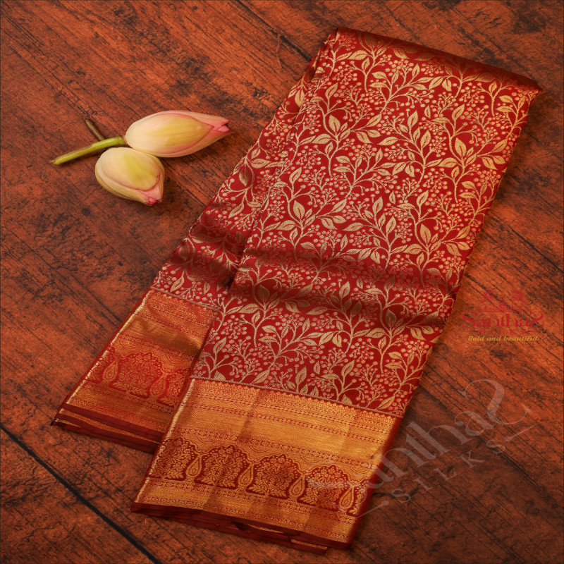 MAROON COLOUR BODY WITH GOLDEN JACQUARD FLORAL EMBOSED WITH SELF BLOUSE & BORDER