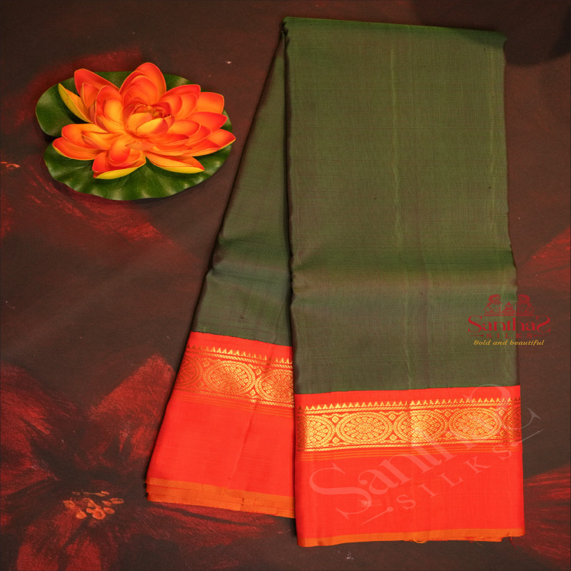 DARK GREEN COLOUR PLAIN BODY WITH CONTRAST BLOUSE & BORDER
