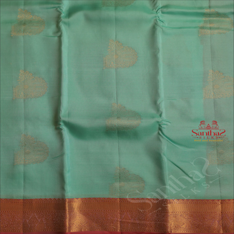 TURQUOISE BLUE COLOUR BODY WITH GOLDEN ZARI BUTTA WITH CONTRAST BLOUSE & BORDER