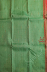 BORDERLESS AQUAMARINE GREEN COLOUR BODY WITH GOLDEN ZARI TEMPLE BUTTA WITH CONTRAST BLOUSE