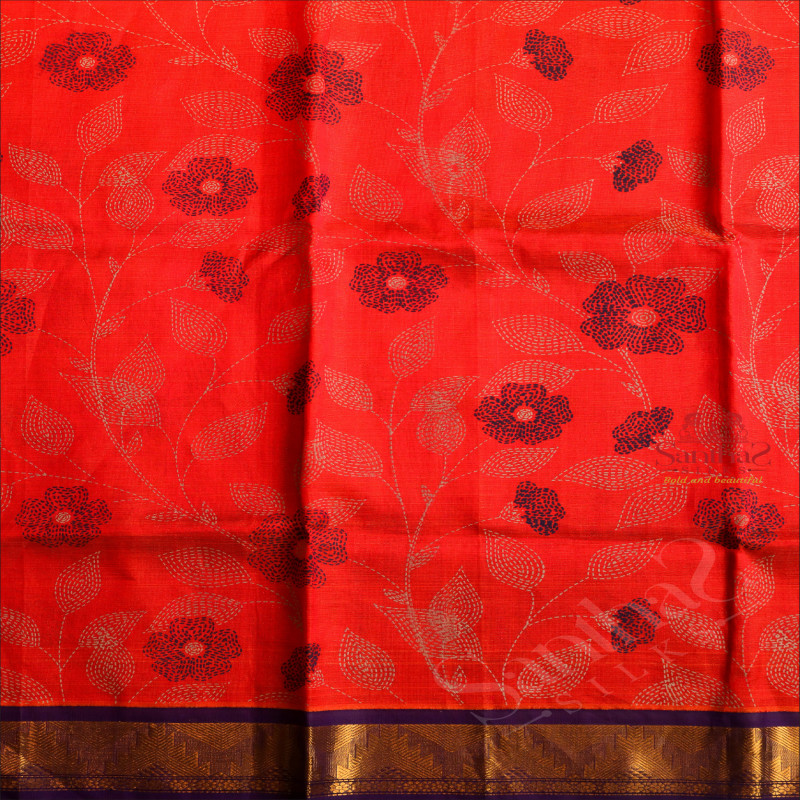 ORANGE COLOUR BODY WITH FLORAL PATTERN EMBOSED WITH CONTRAST BLOUSE & BORDER