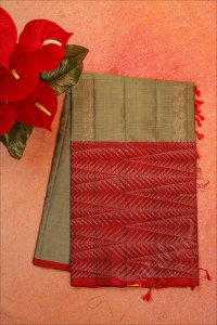 dark-moss-green-colour-body-with-copper-zari-fancy-butta-with-contrast-blouse-border